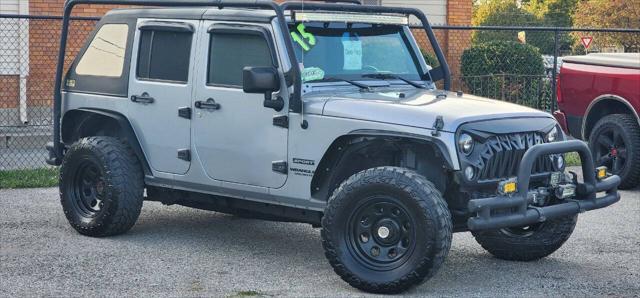 used 2015 Jeep Wrangler Unlimited car, priced at $16,991