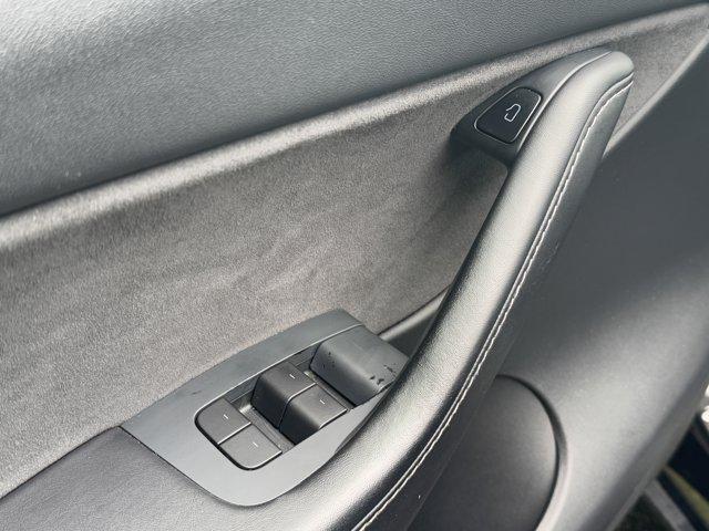 used 2021 Tesla Model Y car, priced at $28,500
