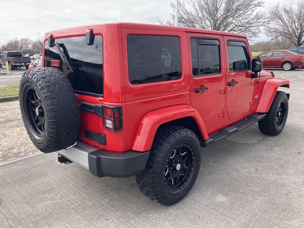 used 2015 Jeep Wrangler Unlimited car, priced at $19,899