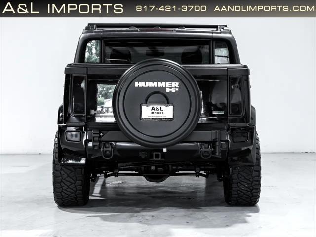 used 2009 Hummer H2 car, priced at $84,950