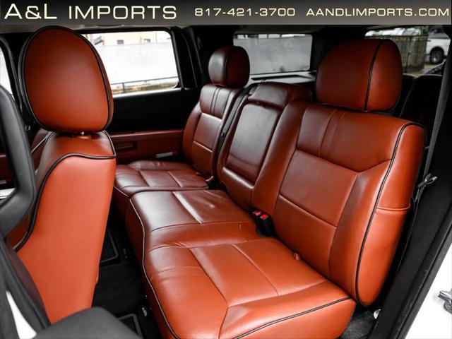 used 2009 Hummer H2 car, priced at $85,950