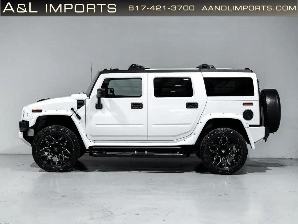 used 2009 Hummer H2 car, priced at $79,950