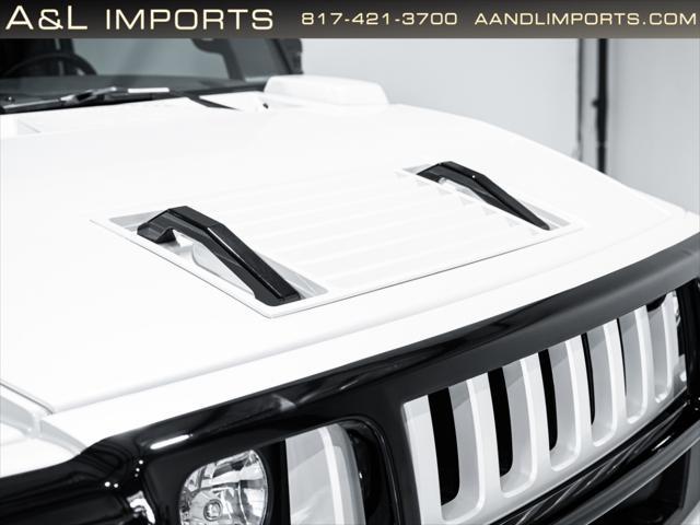 used 2009 Hummer H2 car, priced at $93,950