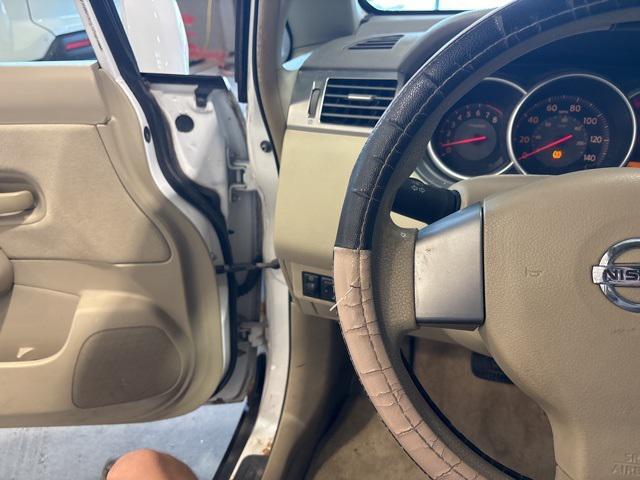 used 2009 Nissan Versa car, priced at $1,999