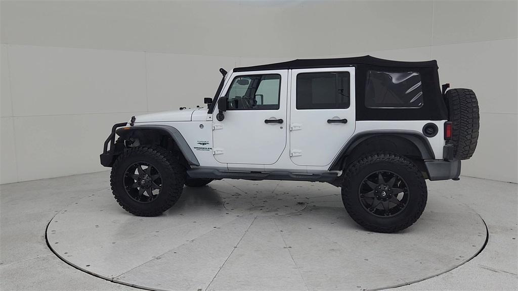 used 2013 Jeep Wrangler Unlimited car, priced at $14,825