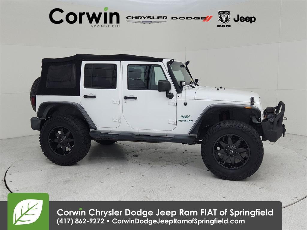 used 2013 Jeep Wrangler Unlimited car, priced at $14,825