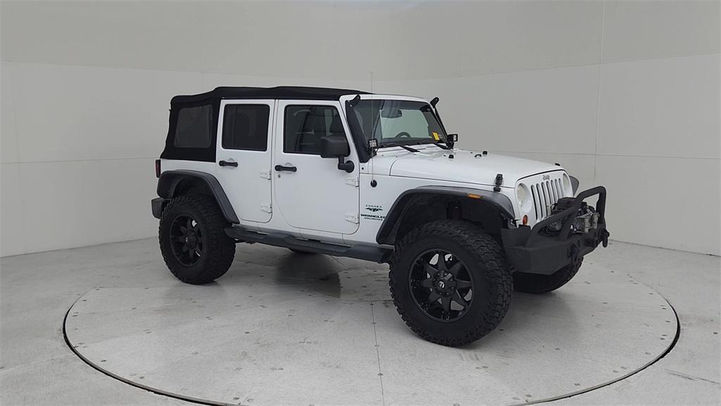 used 2013 Jeep Wrangler Unlimited car, priced at $14,825