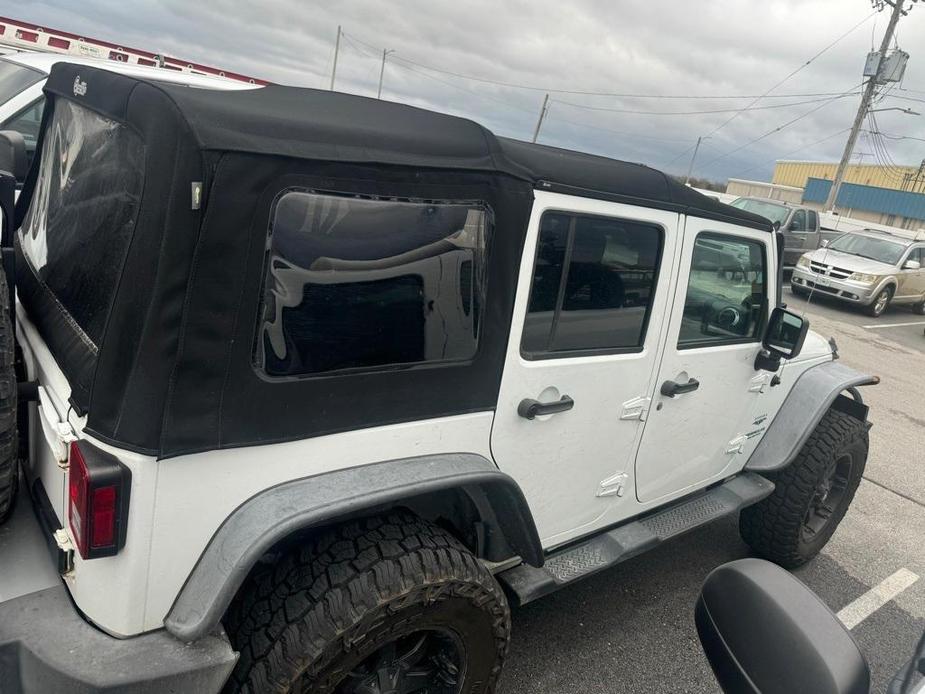 used 2013 Jeep Wrangler Unlimited car, priced at $17,465