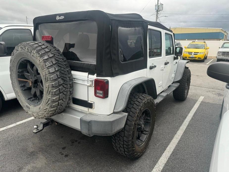 used 2013 Jeep Wrangler Unlimited car, priced at $17,465