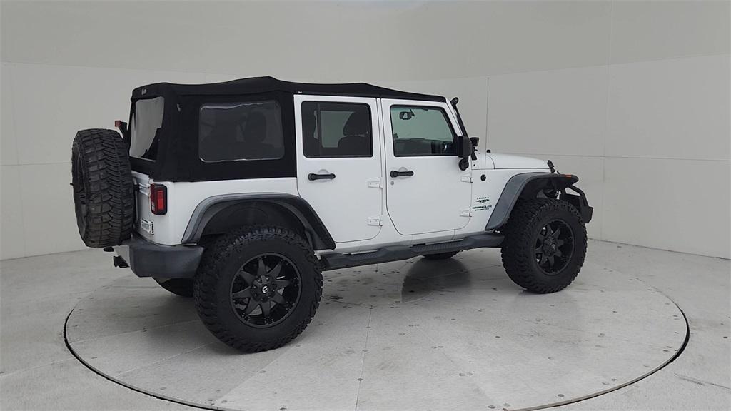 used 2013 Jeep Wrangler Unlimited car, priced at $14,825