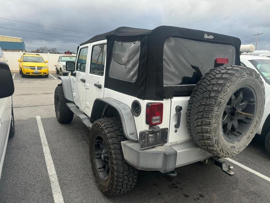 used 2013 Jeep Wrangler Unlimited car, priced at $17,465