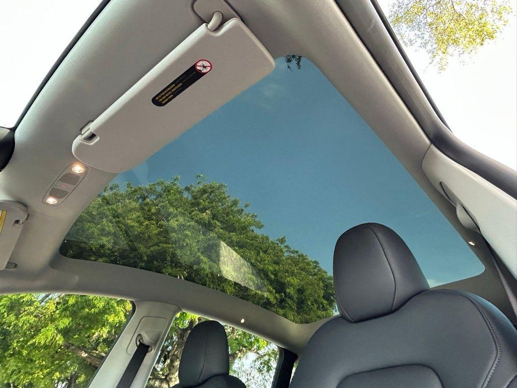 used 2024 Tesla Model Y car, priced at $39,618