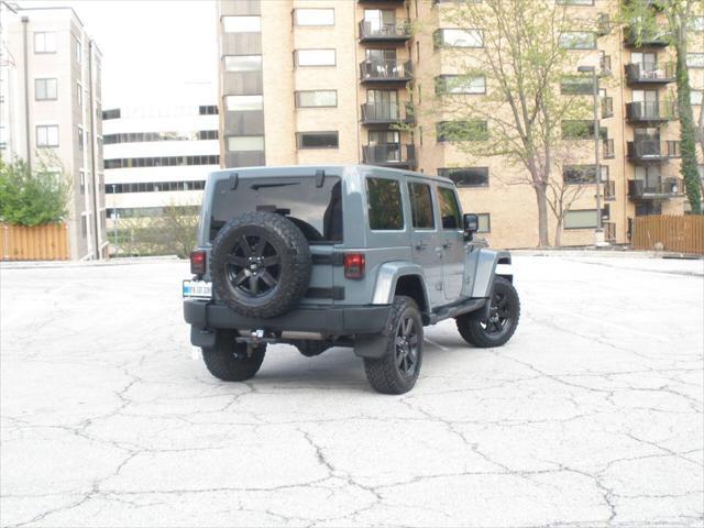 used 2014 Jeep Wrangler Unlimited car, priced at $20,995