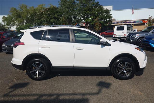 used 2018 Toyota RAV4 car, priced at $13,995