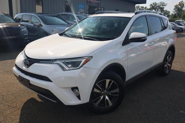 used 2018 Toyota RAV4 car, priced at $13,995