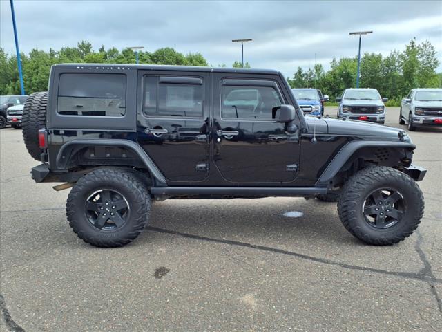 used 2014 Jeep Wrangler Unlimited car, priced at $15,858