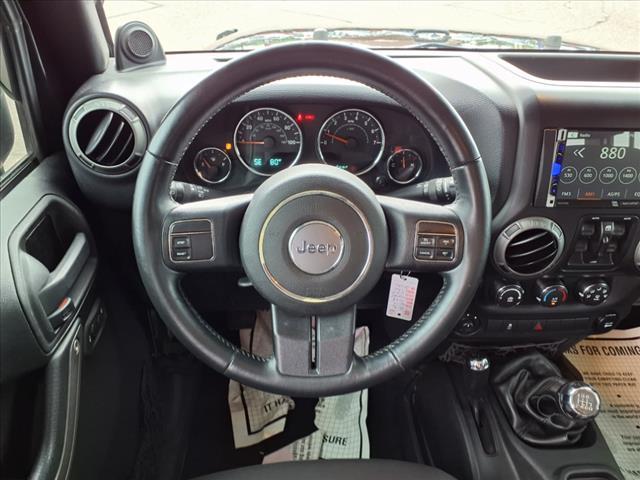 used 2014 Jeep Wrangler Unlimited car, priced at $15,858