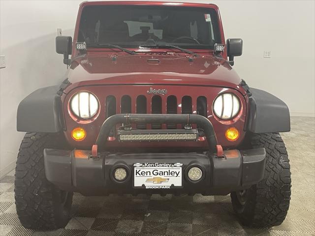 used 2012 Jeep Wrangler Unlimited car, priced at $15,244