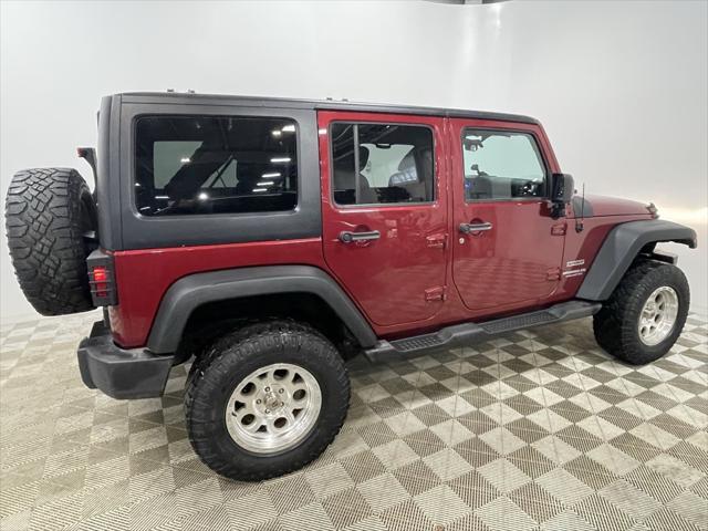 used 2012 Jeep Wrangler Unlimited car, priced at $15,244