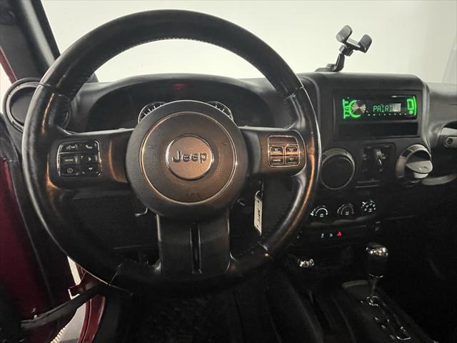 used 2012 Jeep Wrangler Unlimited car, priced at $15,244