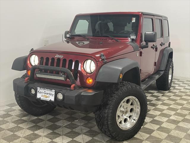 used 2012 Jeep Wrangler Unlimited car, priced at $15,244