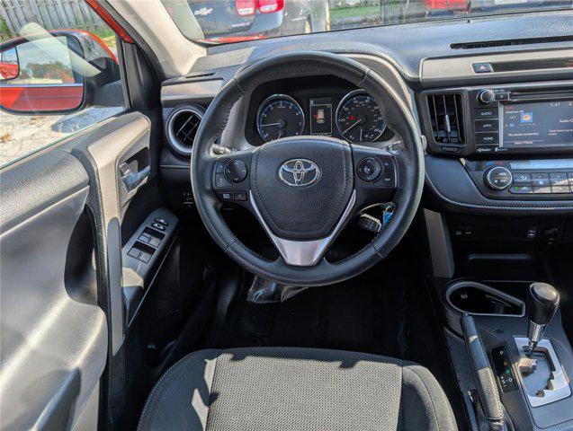 used 2016 Toyota RAV4 car, priced at $15,000