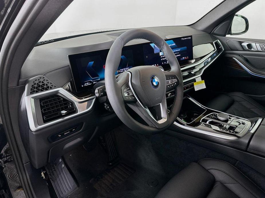 new 2025 BMW X5 PHEV car, priced at $77,710