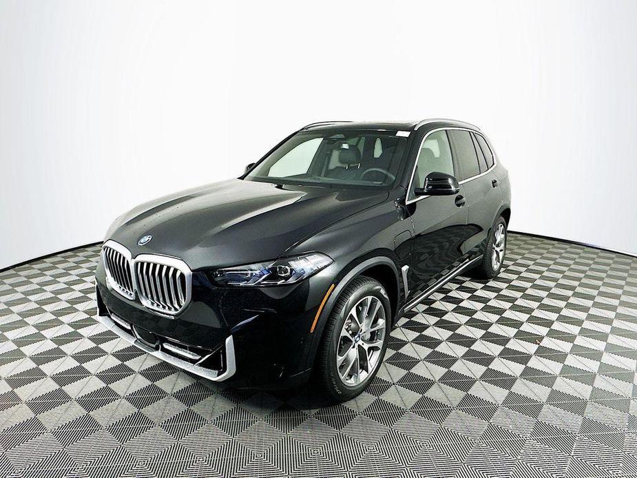 new 2025 BMW X5 PHEV car, priced at $77,710