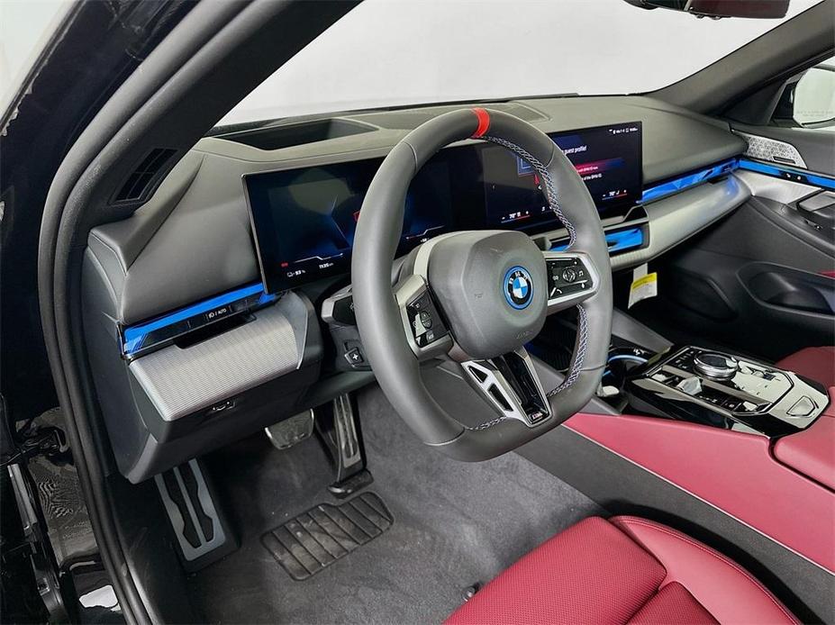 used 2024 BMW i5 car, priced at $92,860