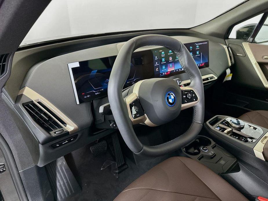 new 2025 BMW iX car, priced at $93,125