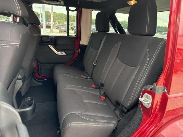 used 2013 Jeep Wrangler Unlimited car, priced at $15,721