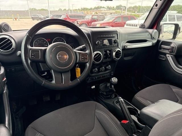 used 2013 Jeep Wrangler Unlimited car, priced at $15,721