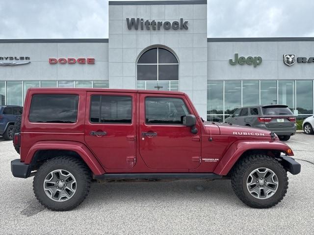 used 2013 Jeep Wrangler Unlimited car, priced at $15,721