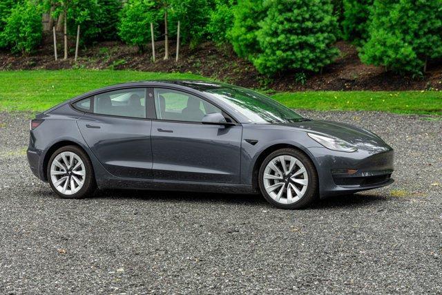 used 2022 Tesla Model 3 car, priced at $22,195