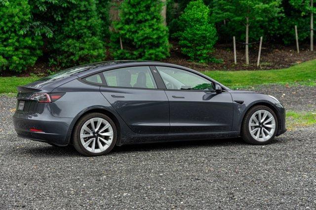 used 2022 Tesla Model 3 car, priced at $22,195
