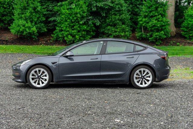 used 2022 Tesla Model 3 car, priced at $22,195