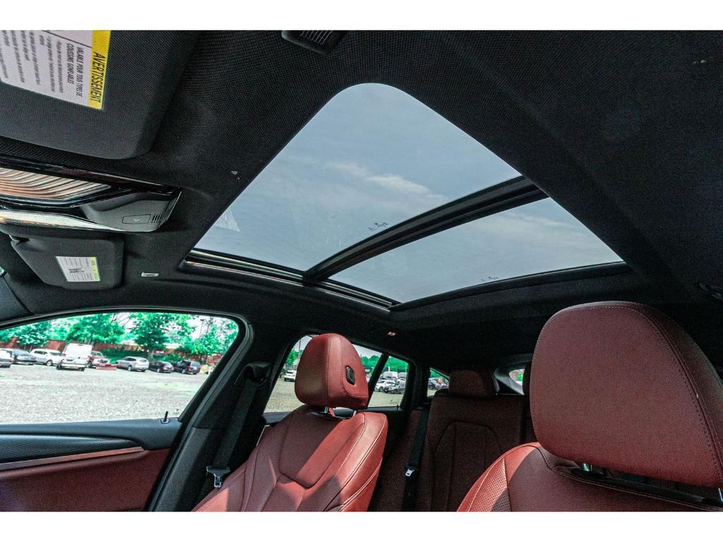 used 2022 BMW X4 car, priced at $31,895