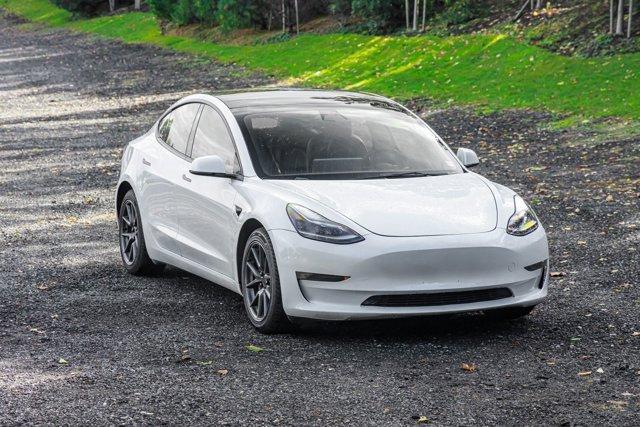 used 2023 Tesla Model 3 car, priced at $15,295