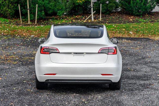 used 2023 Tesla Model 3 car, priced at $15,295