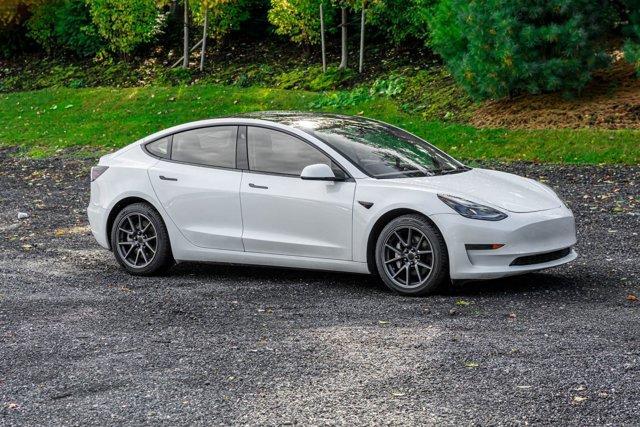 used 2023 Tesla Model 3 car, priced at $15,295