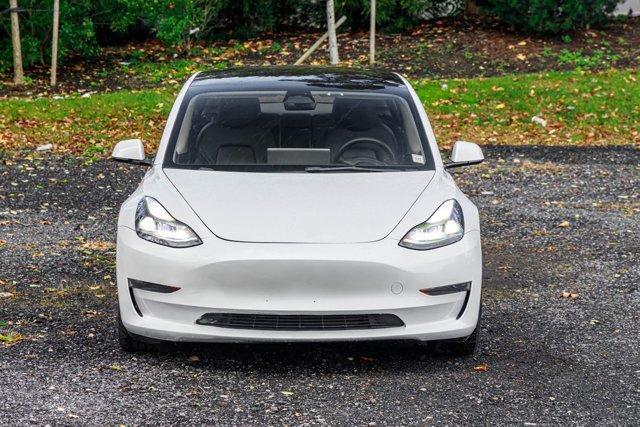 used 2023 Tesla Model 3 car, priced at $15,295