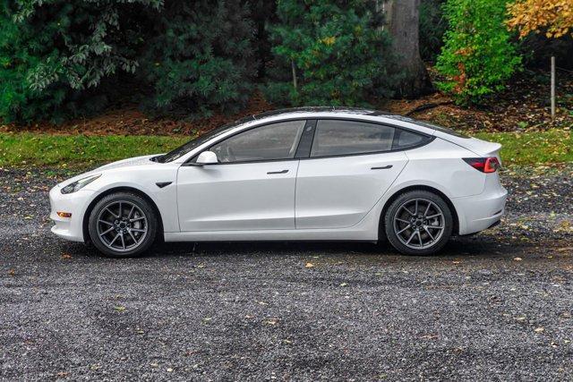 used 2023 Tesla Model 3 car, priced at $15,295