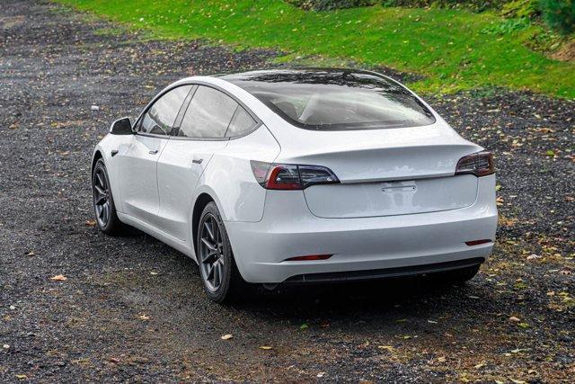 used 2023 Tesla Model 3 car, priced at $15,295