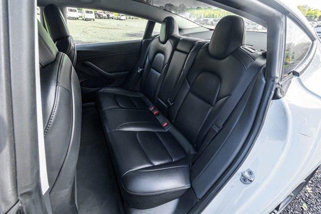 used 2023 Tesla Model 3 car, priced at $15,295