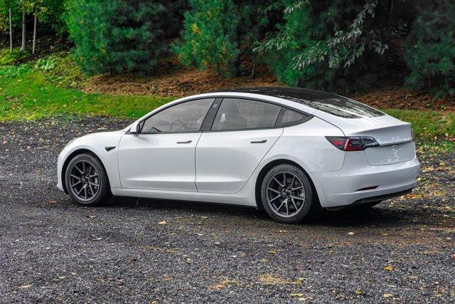 used 2023 Tesla Model 3 car, priced at $15,295
