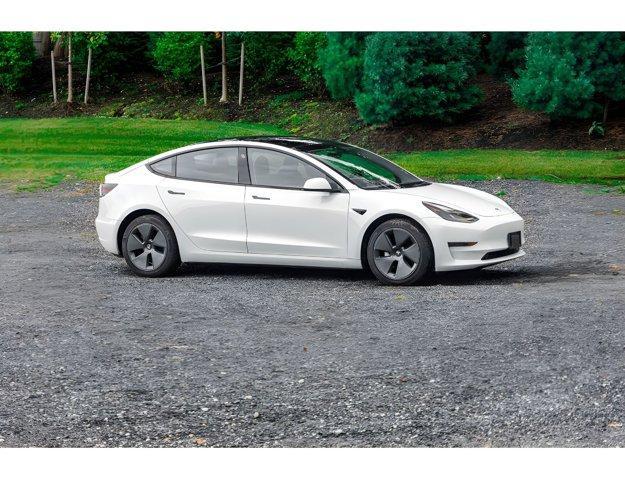 used 2023 Tesla Model 3 car, priced at $21,995