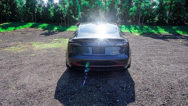 used 2022 Tesla Model 3 car, priced at $22,995