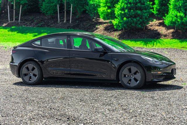 used 2022 Tesla Model 3 car, priced at $22,595