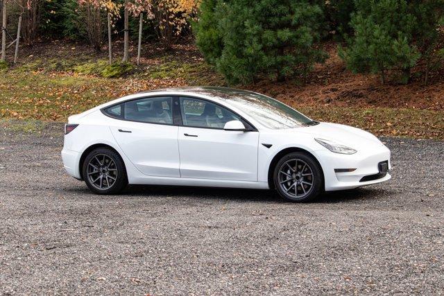used 2023 Tesla Model 3 car, priced at $18,995