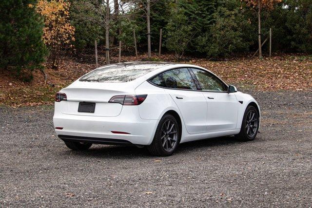 used 2023 Tesla Model 3 car, priced at $18,995